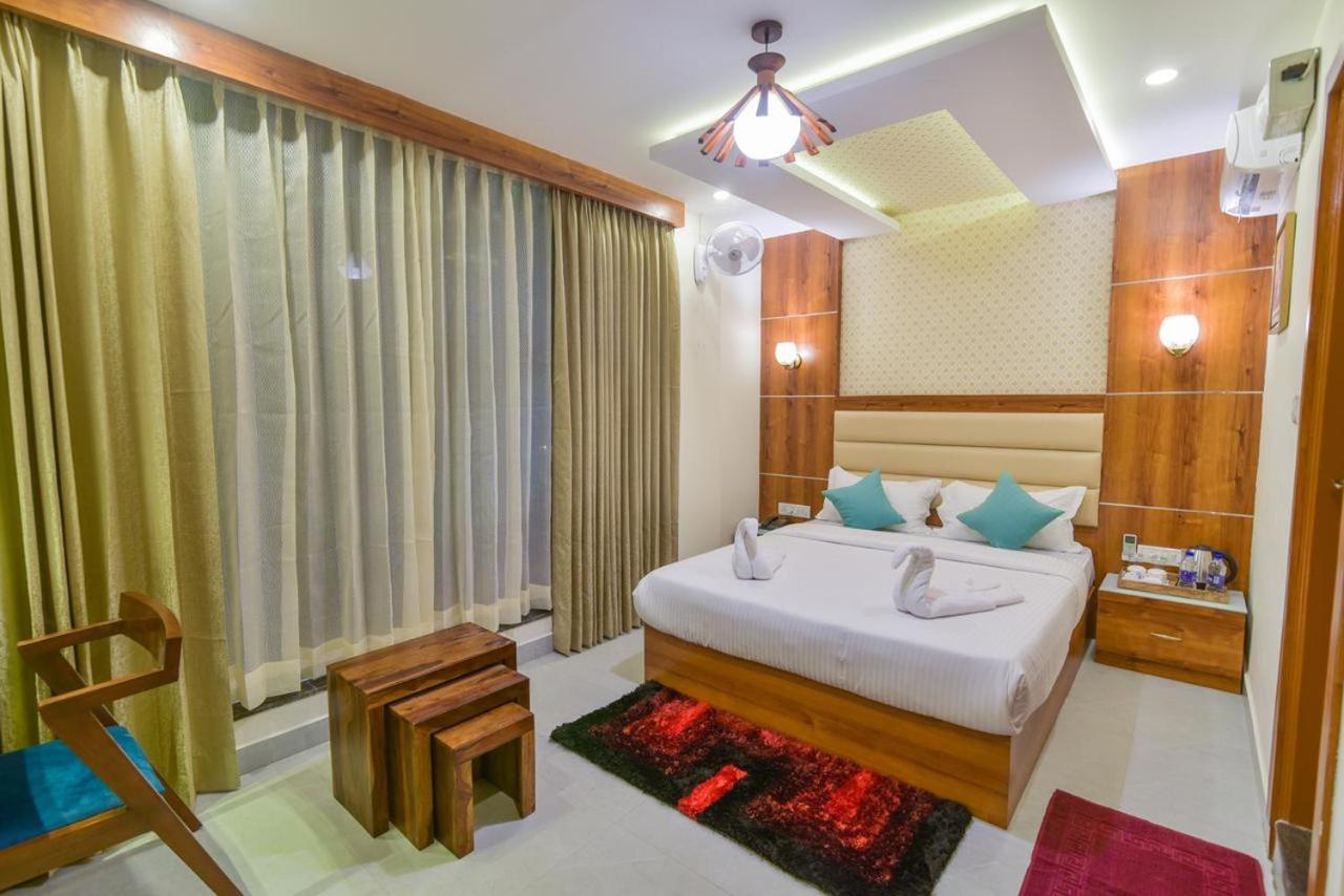 Address 24 Inn Bangalore Esterno foto