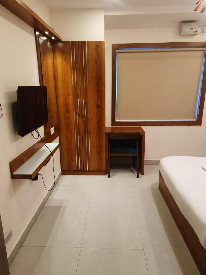 Address 24 Inn Bangalore Esterno foto